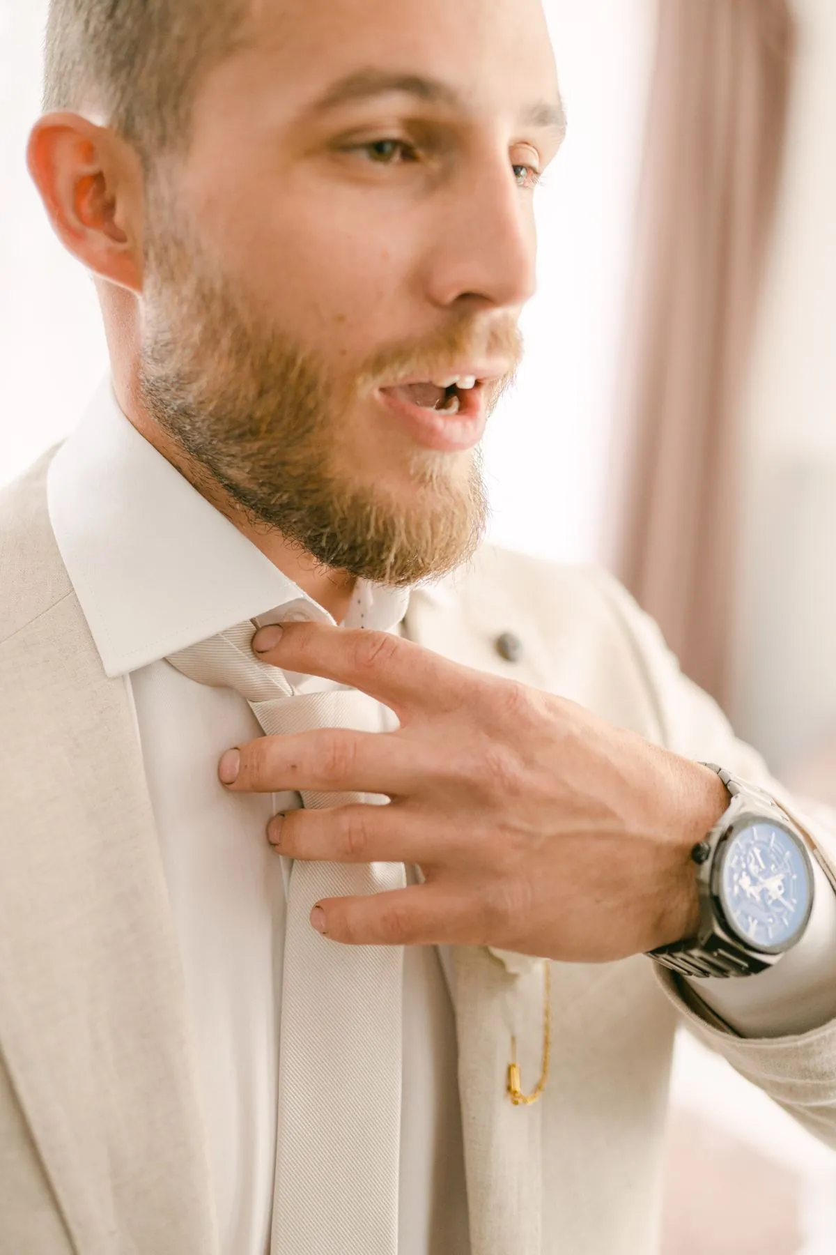 Groom getting ready before the wedding